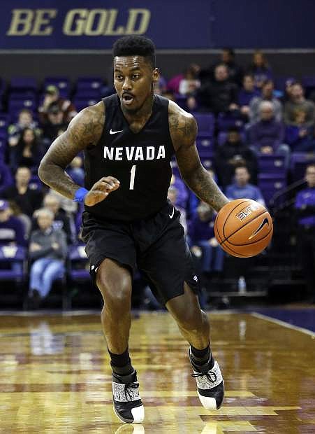 Nevada&#039;s Marcus Marshall in action against Washington Sunday, Dec. 11, in Seattle.