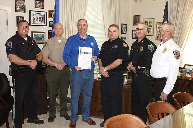 Emergency responders meet with Mayor Ken Tedford as he announces the proclamation of March as Move Over for Emergency Vehicles Month. From left are Thomas Wood, Ben Trotter, Ken Tedford, Dave Lane, Kevin Gehman and Ralph Hamman.