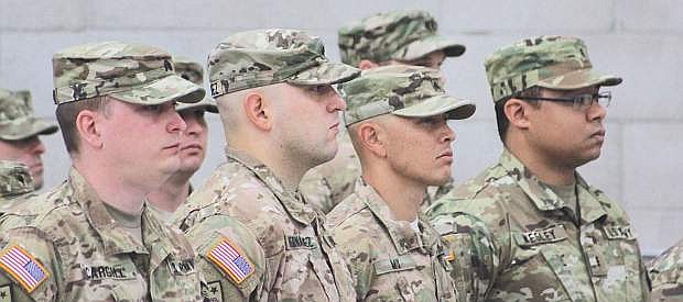 Soldiers from the 17th Sustainment Brigade listen to speakers at their welcoming home ceremony on Saturday.