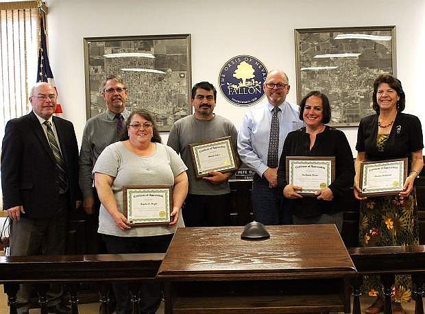 Churchill County recognizes its longtime employees. From left, Commissioner Bus Scharmann, Commisioner Carl Erquiaga, Diane Moyle (Planning Department, 10 years), Manny Lopez (Social Services, 10 years), Commissioner Pete Olsen, Rochanne Downs (Assessor&#039;s Office (5 years) and County Manager Eleanor Lockwood (20 years). Not pictured: Nick Adams (Road Department, 5 years), Jolie Jabines (Sheriff&#039;s Office, 10 years), Jerilyn Whitaker (Sheriff&#039;s Office, 10 years), Karl Zulz (Road Department, 15 years).
