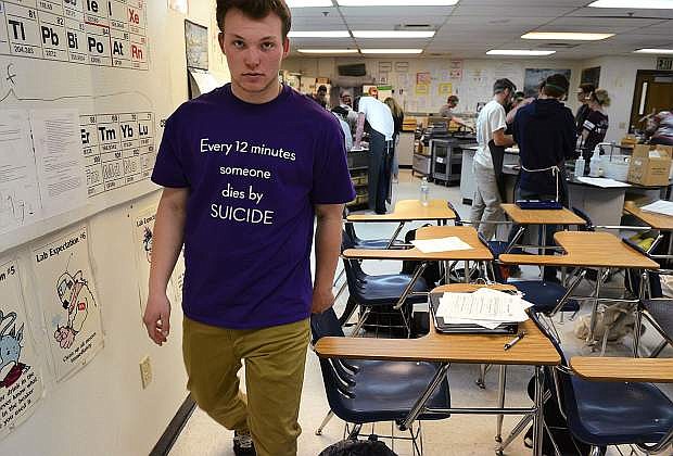 Carson High School senior Jace Keema, 18, walks out of his classroom as part of Drop Dead Day on Wednesday. A different student was pulled out of class every 12 minutes to illustrate the statistic that a suicide occurs every 12 minutes in the United States.