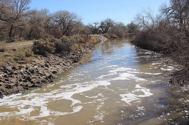 Water flows east of Diversion Dam on Sunday.