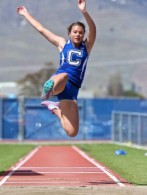 Abbey Paulson competes in the long jump Saturday at the Carson Invite.