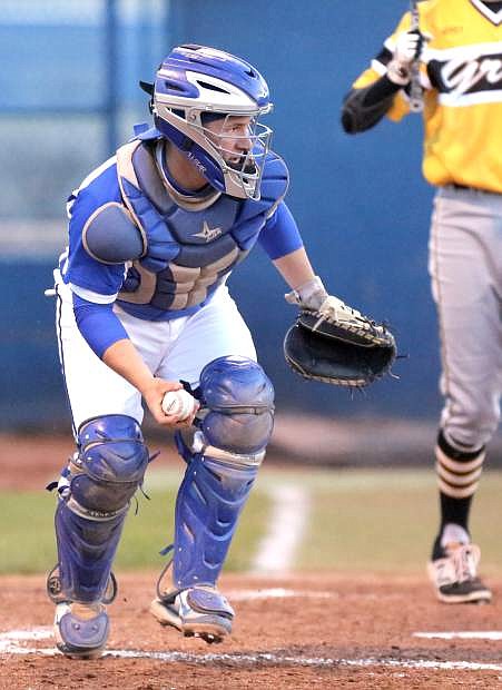 Catcher Trevor Edis checks a baserunner in a game against Galena on Tuesday night.