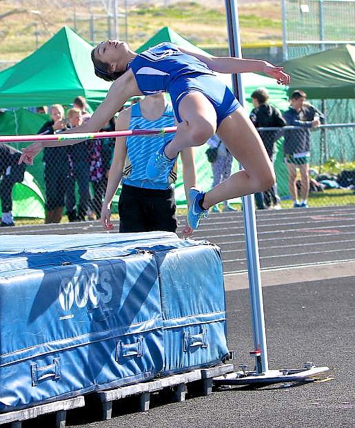 Carson&#039;s Dajarrah Navarro clears the bar Saturday in the girls high jump event at the Reed Rotary Invitational.
