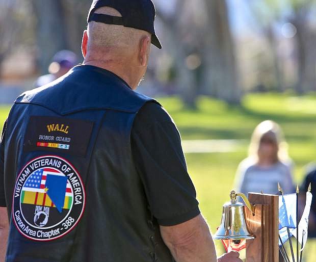 A bell was rung for the 153 Nevadans lost during the Vietnam War Saturday in Mills Park.