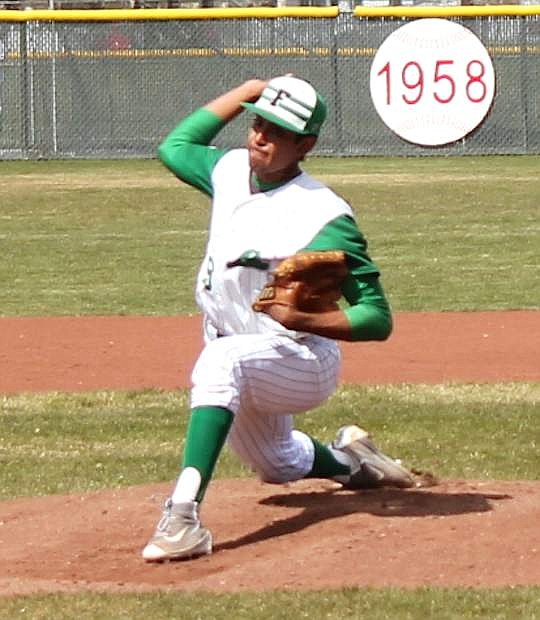 Alex Mendez goes low as he sends out a pitch to one of Fernley&#039;s batters.