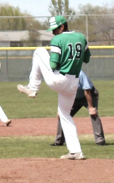 Alex Mendez swings back for a pitch during Tuesday&#039;s game against Fernley.
