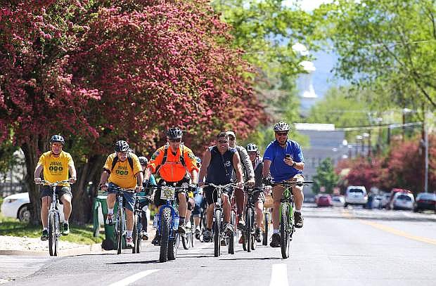 Riders cruise through downtown Carson City during the annual Celebrity Ride in 2015. Bike Month activities kick off with the Celebrity Ride on Tuesday at 11 a.m. at McFadden Plaza. Photo by Cathleen Allison/Nevada Photo Source