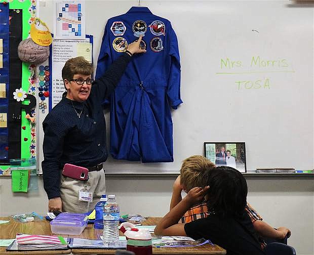 LeAnn Morris of the Carson City School District teaches students about technology opportunities with NASA and other industries during Career Day at Bordewich Bray Elelmentary Friday.