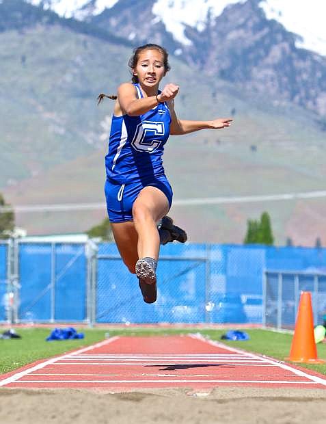 Carson&#039;s Anya Woodbury wins the 4A girls triple jump at the regional championships Saturday with a leap of 36-feet even.