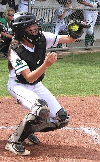 Caitlyn Welch catches a pitch from Kayla Buckmaster during the Wave&#039;s home series against Sparks.