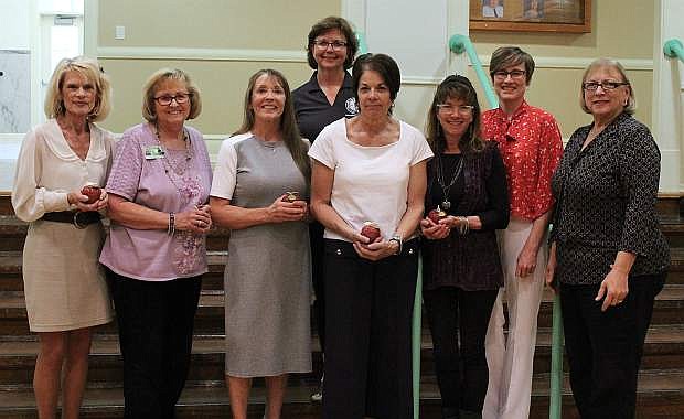 The board recognizes 2017 staff retirees (from left) Carol I. Reynolds-Woodsford, Arlene Detomasi, Teresa Moyle, Patricia Fleming, Debra Smotherman, Kirsten Ann Wilson and Lucy Rickman with trustee Kathryn Whitaker and Superintendent Dr. Sandra Sheldon. Not pictured are Robert Freeman, Eileen Haugen, Joan Hutchings, Diana Strickland and David Wuth.