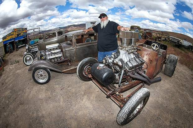 Rat rod builder Farrell Hurt poses with some of his favorite creations at his home in Stagecoach, Nev. on Monday, May 15, 2017. His cars will be on display during the Rockabilly Riot on June 22-25 in Mills Park. Photo by Cathleen Allison/Nevada Photo Source