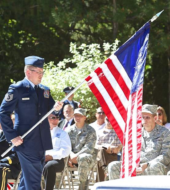 A Nevada Air Guard NCO presents the Betsy Ross Flag during the five flag ceremony Wednesday morning at the Capitol.