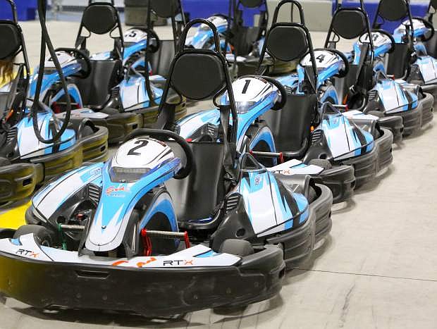 Karts are lined-up at the Carson Raceway indoor track.