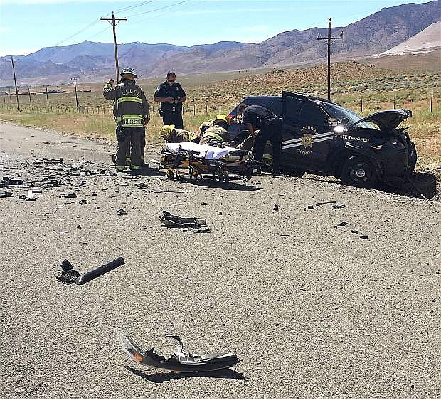 One person died Monday afternoon after a car collided head-on with a Nevada Highway Patrol trooper outside of Dayton.