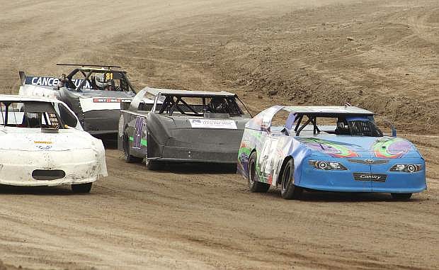 Racers bolt around the track during Rattlesnake Raceway&#039;s Octane Fest race day.