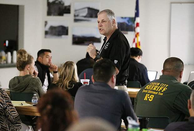 Robert Pennal, a retired special agent supervisor with the Office of the Attorney General, California Department of Justice, speaks to a group of regional law enforcement agencies at the Carson City Sheriff&#039;s Office in Carson City, Nev. on Friday, June 9, 2017. Partnership Carson City funded the training session on the dangers first responders face from fentanyl and butane hash oil. Photo by Cathleen Allison/Nevada Photo Source