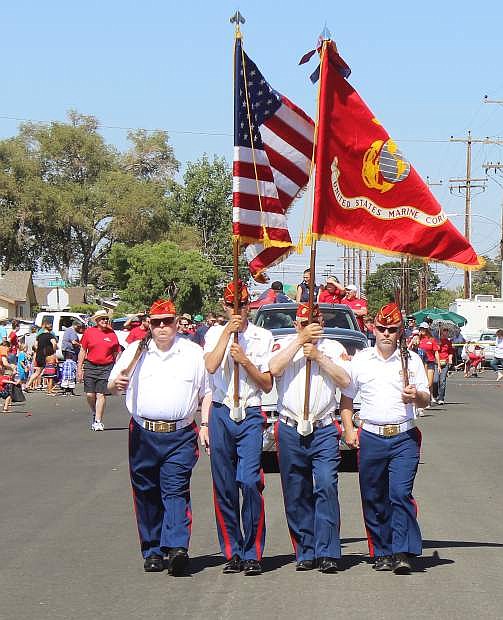 The Marine Corps Reserve High Desert League honor guard opens the July 4 parade last year.
