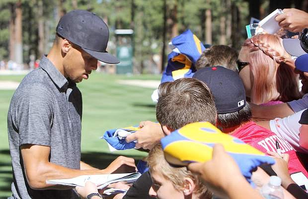 Steph Curry signs autographs at last year&#039;s American Century Championshp.