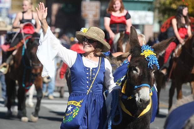 Lin O&#039;Kelley and Chili walk with the Wild Ass Women in Nevada Day parade 2013