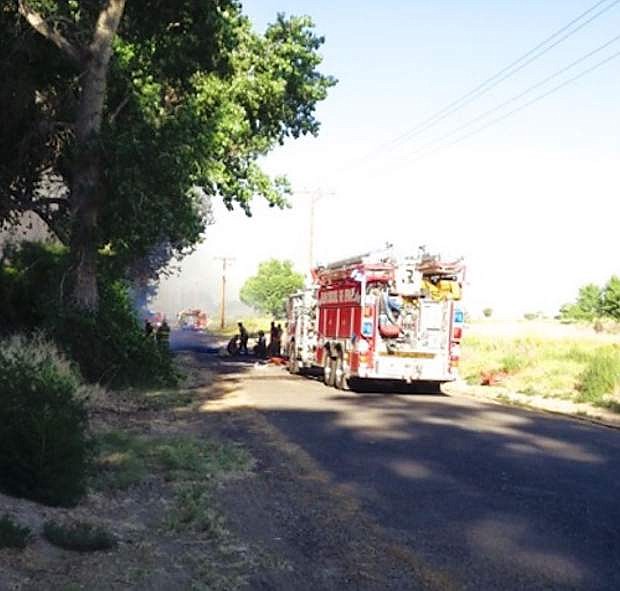 Fallon firefighters respond to a fire on Reservoir Road on Monday.