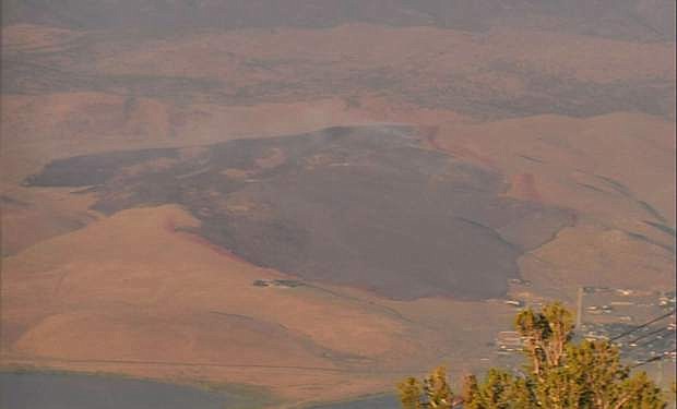 The burn scar of the Brenda Fire is seen Friday evening from the fire camera on Slide Mountain.