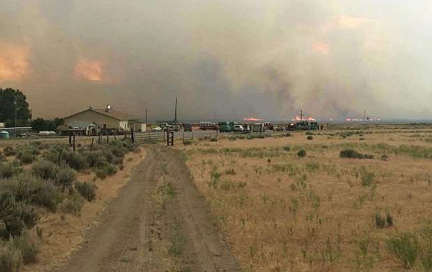 Fire approaches ranches near Cold Springs.