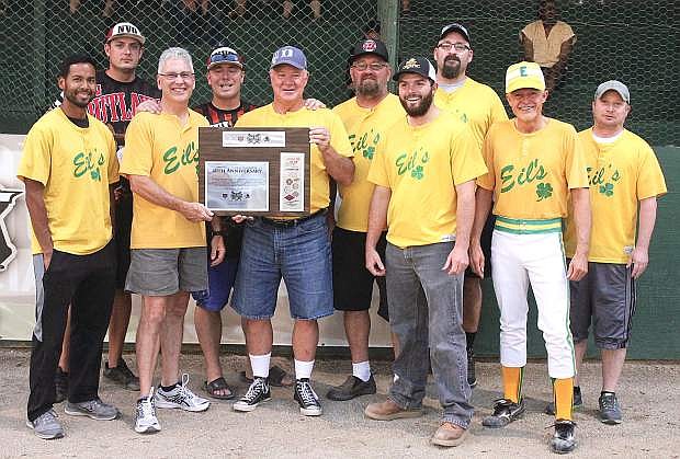 Eileen&#039;s 2017 team accepts a plaque commemorating their 40th season in the Oasis Adult Softball Association.