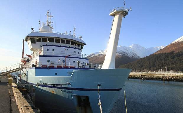 FILE- In this Feb. 25, 2015 file photo, the National Science Foundation research ship Sikuliaq is seen moored in Seward, Alaska. Scientists on board a federal research ship will depart for the Arctic Ocean this week to study how changing winds affect plant and animal species. The Sikuliaq will depart Friday, Aug. 25, 2017, from Nome for the Beaufort Sea. (AP Photo/Dan Joling, File)