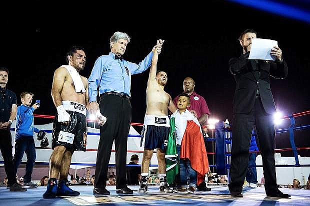 Reno native Oscar Vasquez is declared the winner of the main event after 10 rounds.
