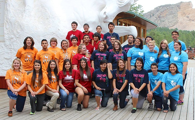 Jarrette Werk (top row, far left) was one of 30 students who completed the rigorous eight-week program at the Indian University of North America a few summers ago. Students got a jump start on their post secondary education by taking a full load and working 20 hours a week at the Crazy Horse Monument.