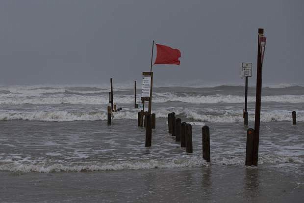Water rises at Bob Hall Pier in Corpus Christi, Texas as Hurricane Harvey approaches on Friday, Aug. 25, 2017. The slow-moving hurricane could be the fiercest such storm to hit the United States in almost a dozen years. Forecasters labeled Harvey a &quot;life-threatening storm&quot; that posed a &quot;grave risk&quot; as millions of people braced for a prolonged battering. (Courtney Sacco/Corpus Christi Caller-Times via AP)