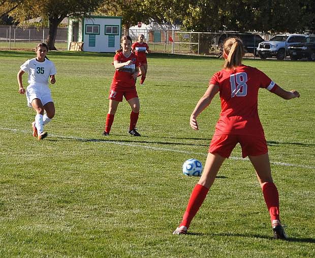 Fallon&#039;s Maddie Guerrero and Truckee&#039;s Lydia Christian face off over the ball.
