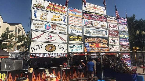 Carson City BBQ proudly displays its wins since 1998 outside of its booth at the Best of the West Nugget Rib Cook-Off Aug. 29-Sept.3.