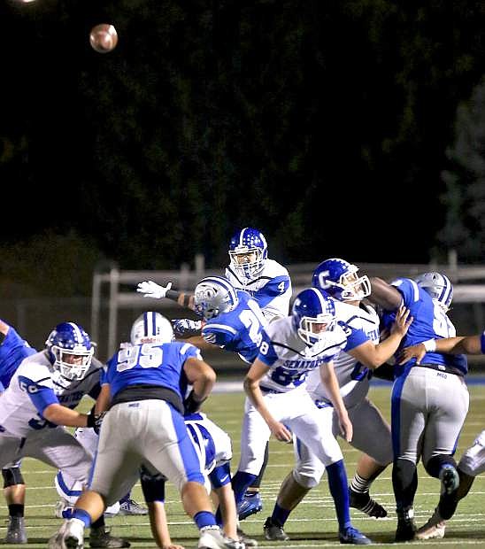 Carson kicker Tanner Kalicki puts up one of his two successful first-half field goals Friday night against McQueen.