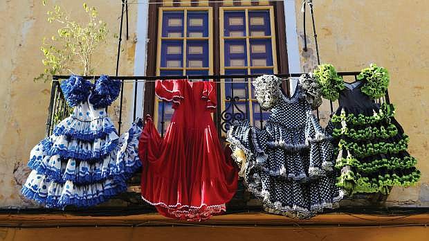 After a night of dancing, dresses are washed and hung to dry in Spain.