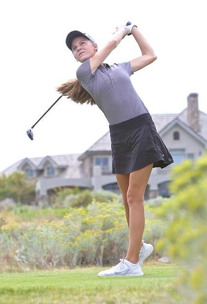 Freshman Karen Beglin tees off for the Senator golf team Wednesday at Arrowcreek in Reno.
