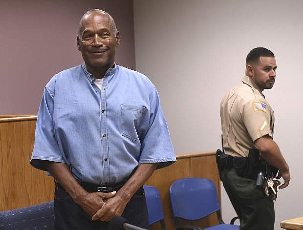 FILE - In this July 20, 2017, file photo, former NFL football star O.J. Simpson enters for his parole hearing at the Lovelock Correctional Center in Lovelock, Nev. A Nevada prisons official says a plan is in place for Simpson to be released to parole as early as Monday, Oct. 2, 2017, from a facility in the Las Vegas area. Nevada Department of Corrections spokeswoman Brooke Keast said Wednesday, Sept. 27 that the process and documents still must be finalized for Simpson&#039;s release after nine years behind bars for an armed robbery conviction. (Jason Bean/The Reno Gazette-Journal via AP, Pool, File)