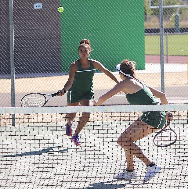 Brynlee Shults and Brooklynn Whitaker battle Truckee on the CCHS tennis court.