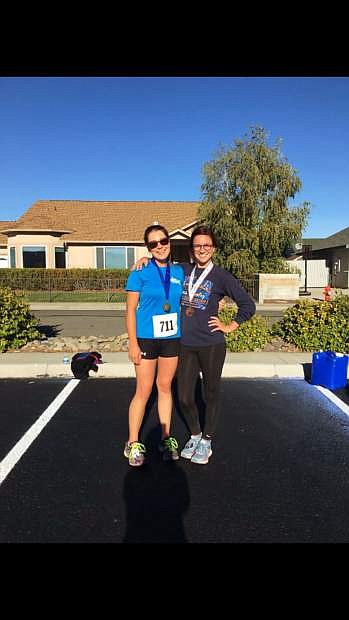Avery Hudak, left, won the Carson City Kiwanis Club&#039;s Pancreatic Cancer Awareness Day 5K last year and will return for this year&#039;s event Saturday. The event raises money for the Pancreatic Cancer Action Network and a local scholarship.