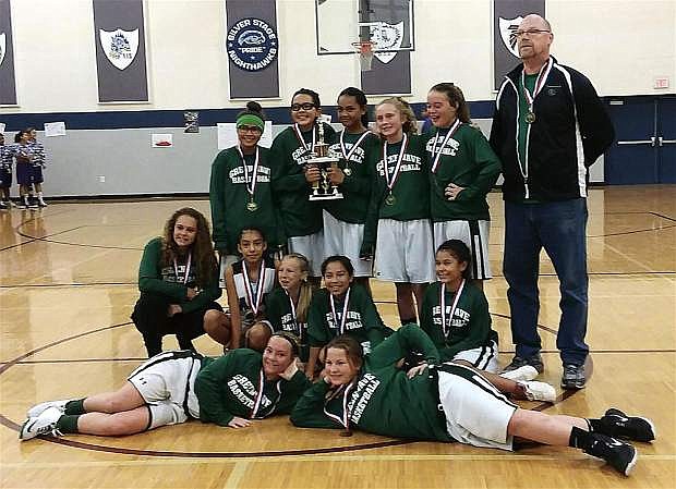 The Churchill County Middle School 7th grade girls&#039; basketball team won the league championship after an undefeated season. Pictured in no order are Darci Owens, Liliona Bettencourt, Baley Skeen, Kambrie Thorn, Ramona Norris, Payton Smith, Lexi Freeman, Kaiserita Otuafi, Mattea Cortez, Kaitlynn Hoffman, Skai Shults and coach Keith Lund.