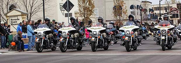 Carson City Sheriff&#039;s Officers ride down newly remodeled Carson Street Saturday morning.