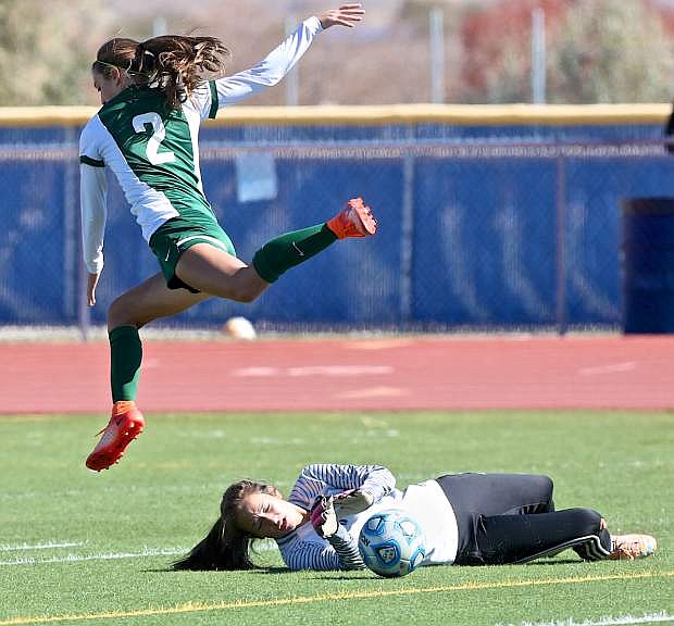 Carson&#039;s goalie Marissa Perez makes a diving save Saturday at the Jim Frank Track and Field Complex.