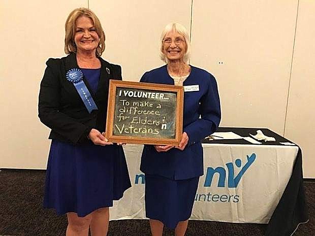 From left, Susan Haas, Executive Director &amp; CEOof Nevada Rural Counties RSVP Program, Inc. and AmeriCorps VISTA member Lyndia Todoroff accept the Governor&#039;s Points of Light Award Oct. 5.