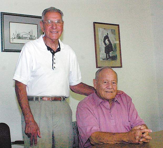 Educators Ed Arcniega, left, and Elmo Dericco attended a reunion in 2007 for the 50th anniversary of the 1957 sports teams winning state titles. Arciniega passed away on Wednesday at the age of 92.
