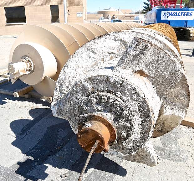 A 40-year-old lifting screw sits beside a brand new one that is ready to be installed Wednesday at the Carson City Water Resource Recovery Facility.