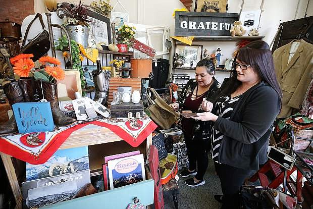 Erica Ayala, left, and Jenny Penny shop in Kaleidoscope in Carson City, Nev., on Friday, Nov. 17, 2017. The travel website, Expedia, named Carson City one of its Top 25 Best American Towns for Holiday Shopping. Photo by Cathleen Allison/Nevada Momentum