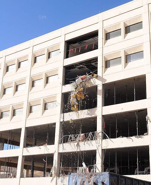 Crews from Advance Installations and Las Vegas Demo worked through the Veterans Day holiday gutting the old Kinkead Building in preparation for tearing down the concrete and steel frame.